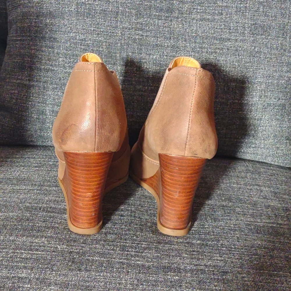 Audrey Brooke leather wedge booties.